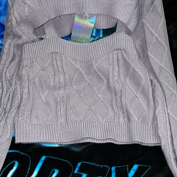 Its a 2 piece turtleneck/ cami. Its more of a lavender color though than purple - Picture 2 of 2